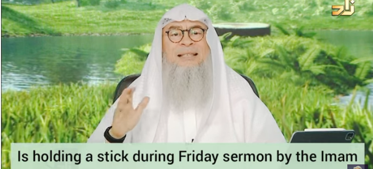 Is holding a stick during friday khutbah (sermon) by the imam, part of the sunnah?