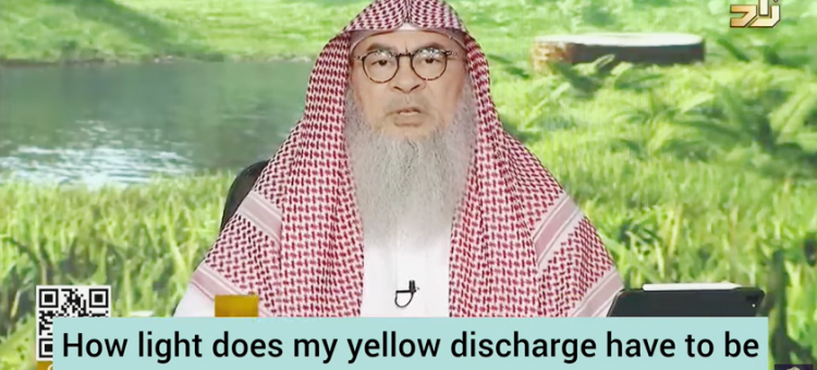 How light should yellow discharge be after menses to consider sign of purity?