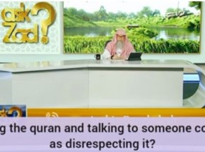 Is pausing Quran & talking to someone considered as disrespecting the Quran?