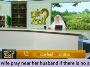 Can a wife pray near husband if there's no space, her head touches his knees in ruku