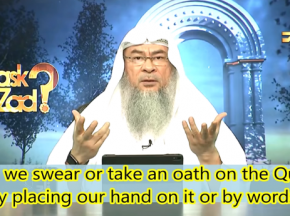 Can we swear or take an oath on Quran by placing our hand or by words?