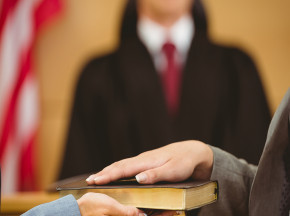 Placing One’s Hand on the Torah or the Gospel to Testify under Oath